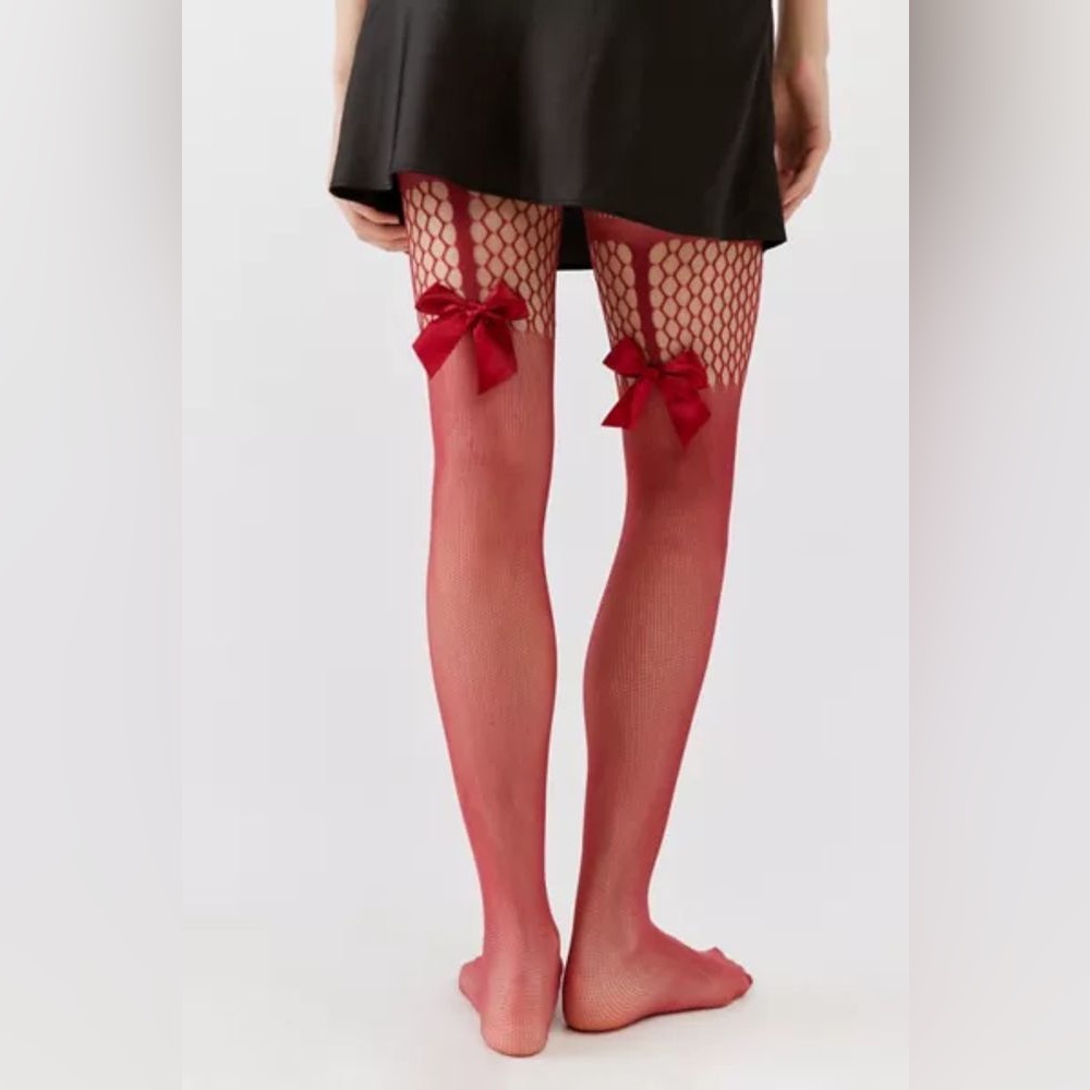 URBAN OUTFITTERS
High Bow Mixed Fishnet Tight-Wine